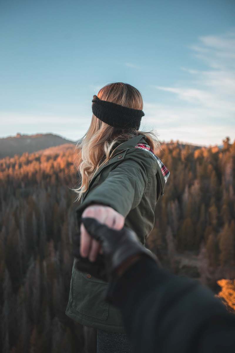 people person holding hand of woman person