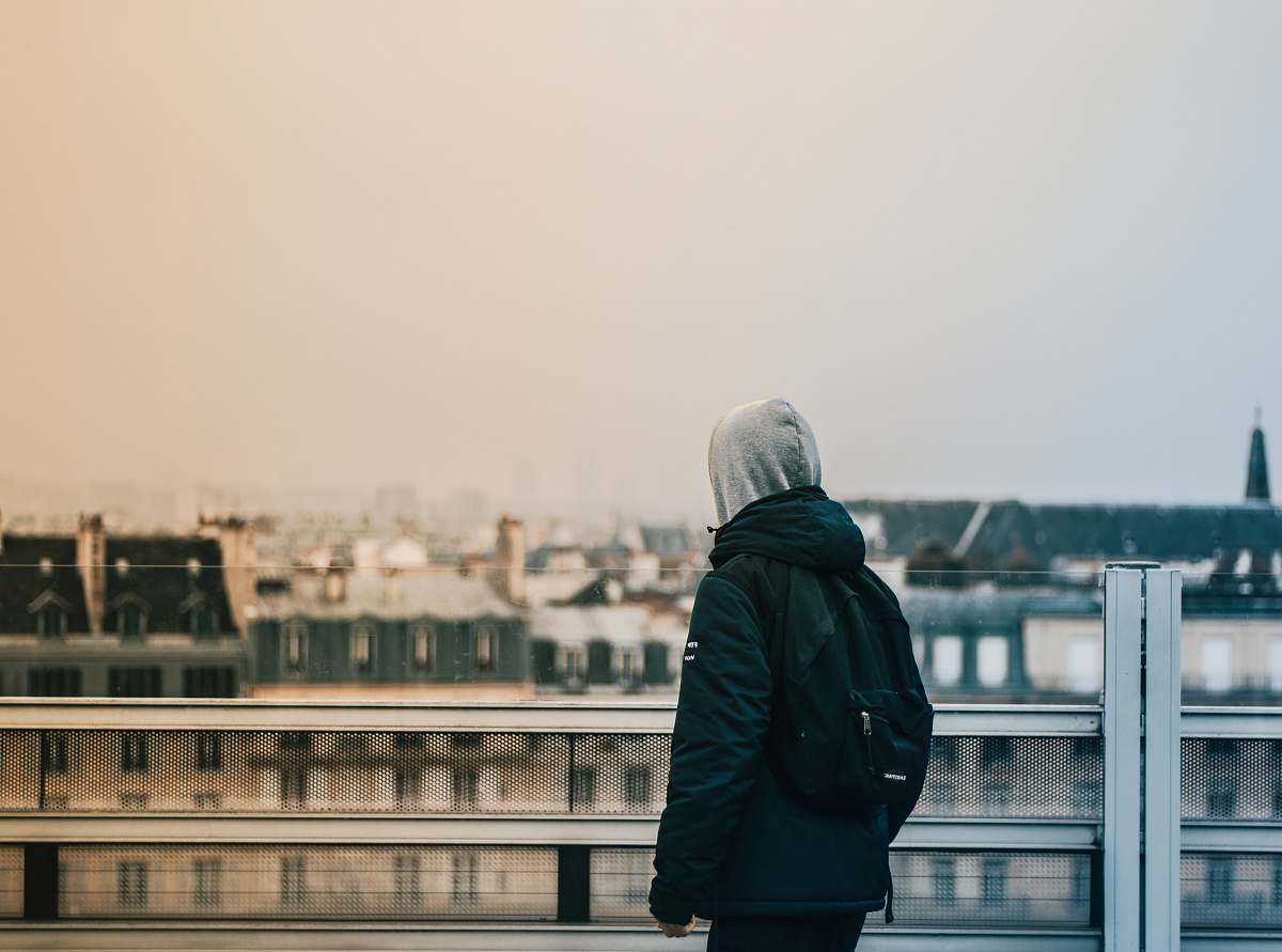 person person standing in front of building people