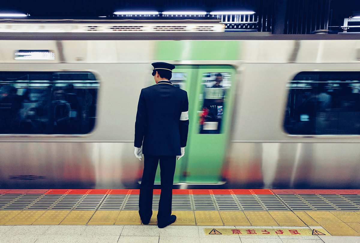 person security guard on train station train