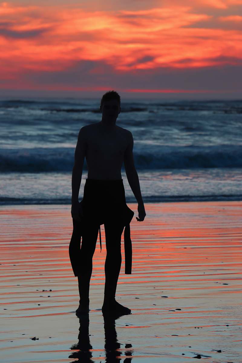 person silhouette of man near ocean people