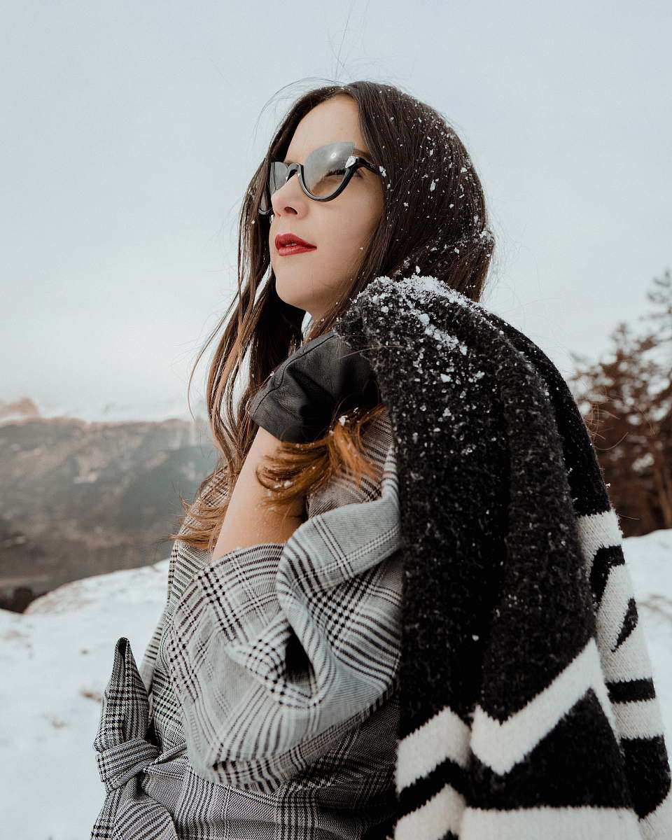 people woman holding black coat person