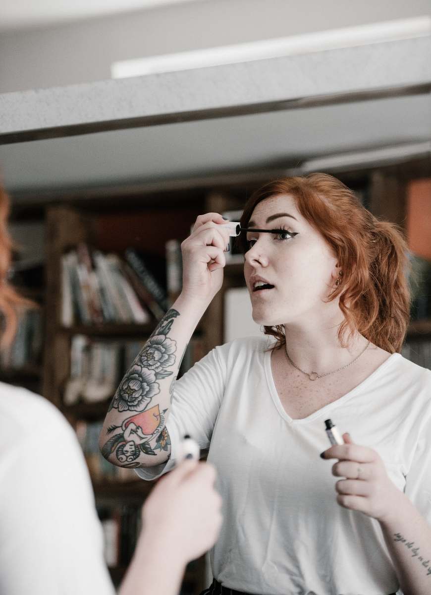 people woman holding makeup rush person
