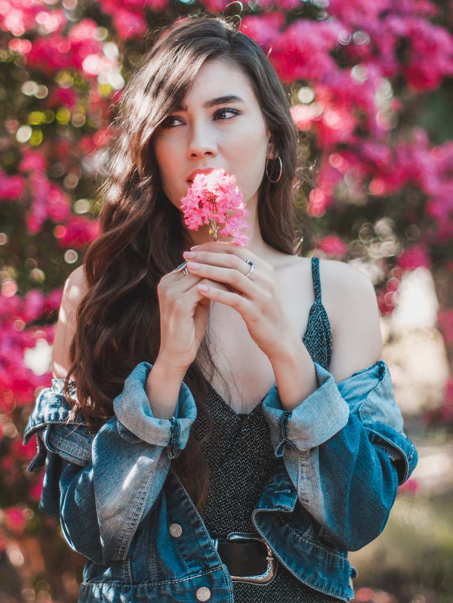 people woman holding pink flower person