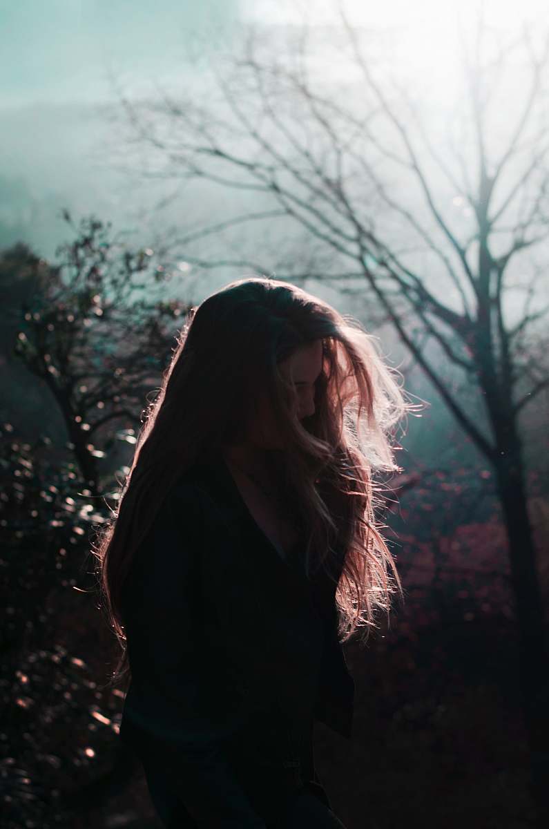 people woman in black coat standing person