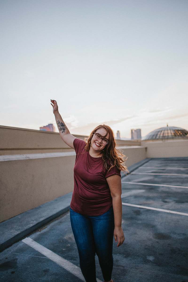 person woman on top of building people