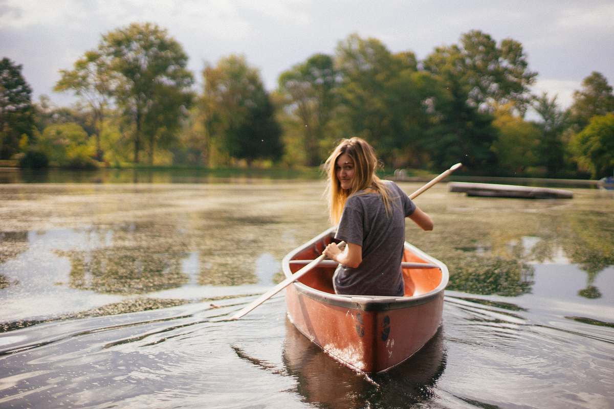 boat woman riding boat canoe