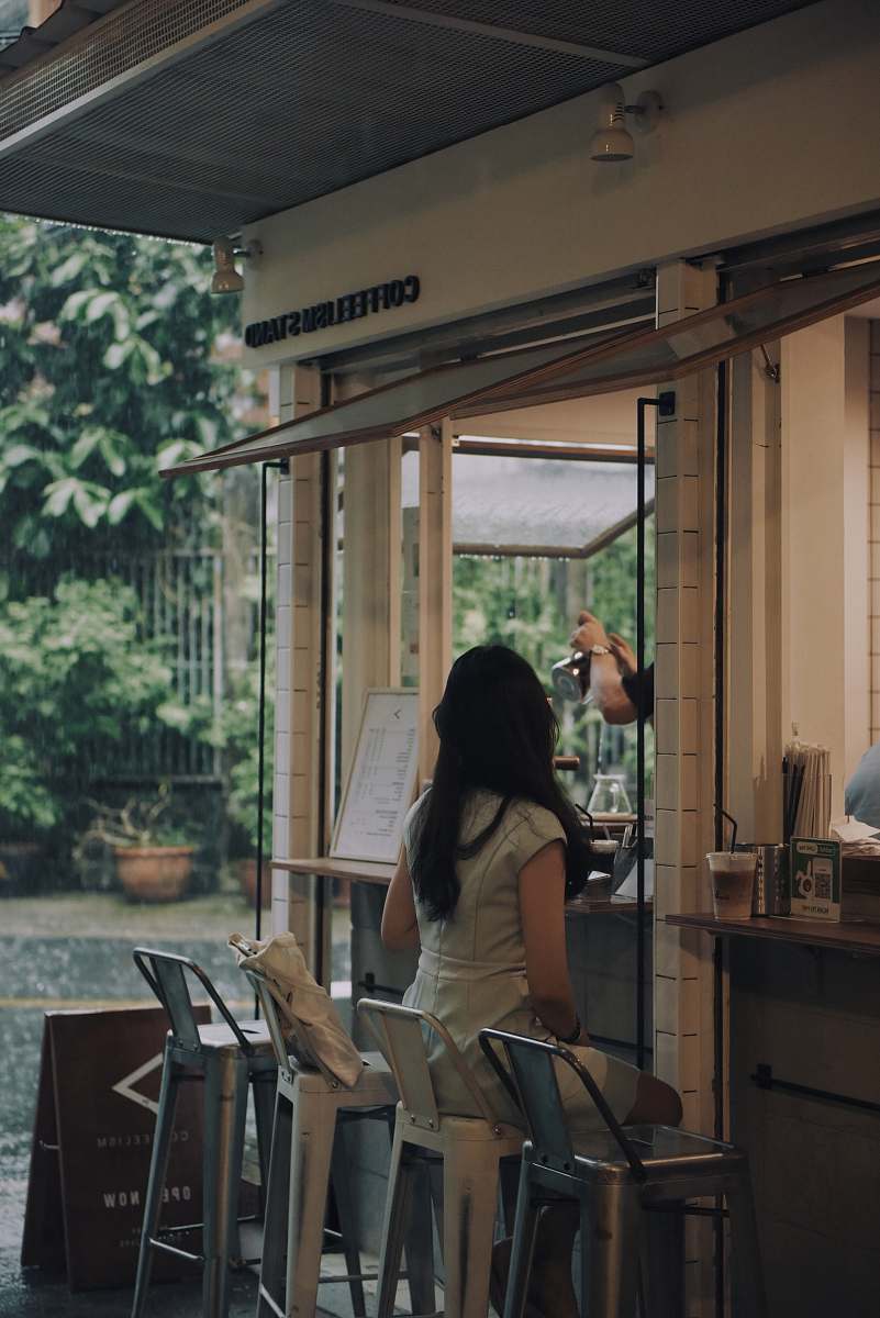 people woman sitting on bar chair person