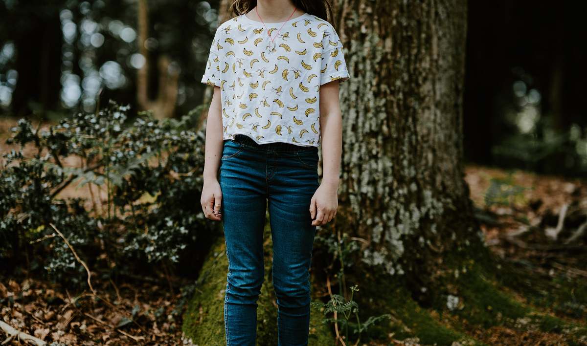 people woman standing in front of tree person