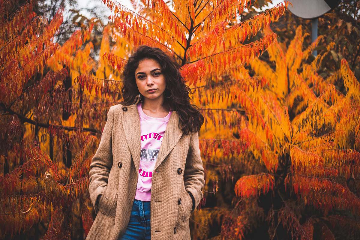 people woman standing near trees person