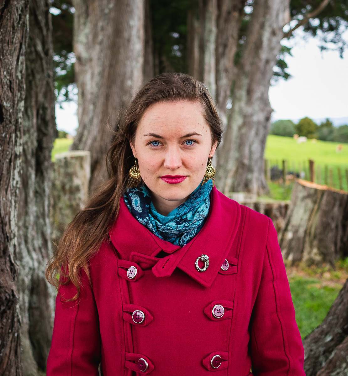 person woman standing near trees people