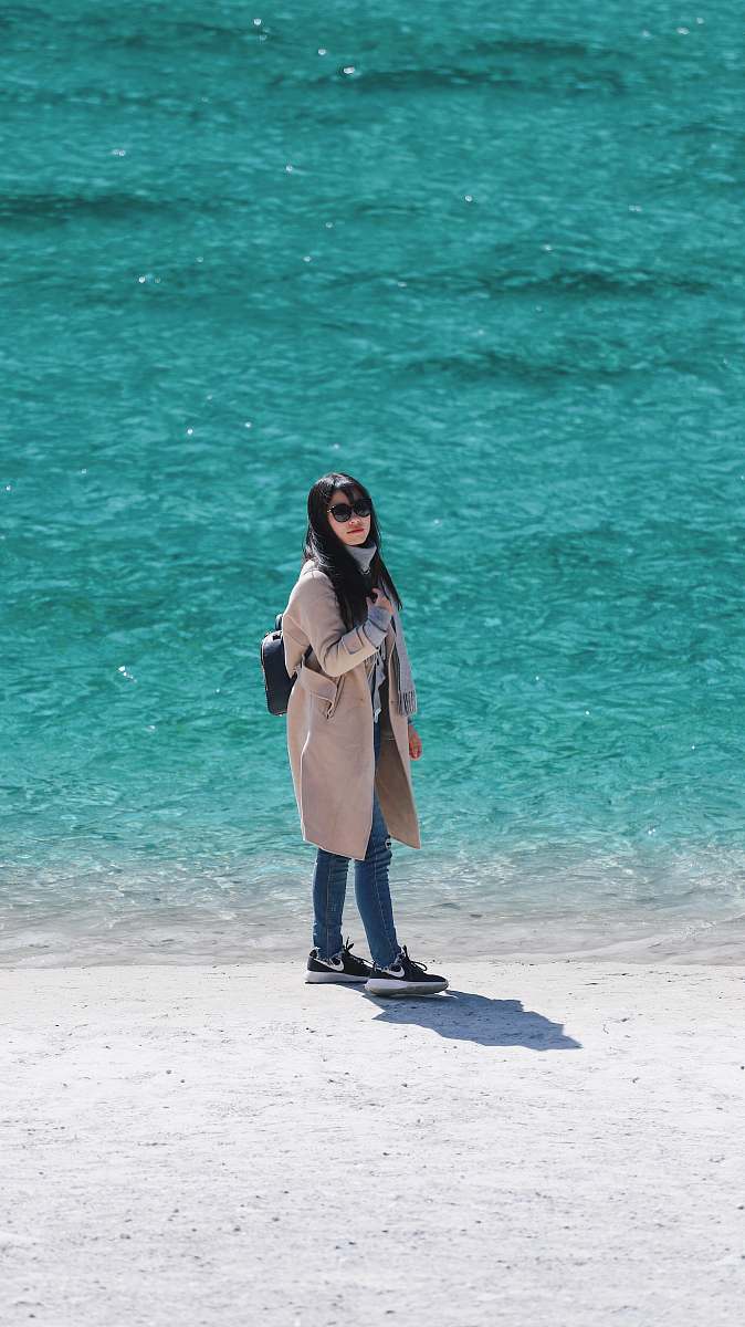 people woman standing on beach shore person