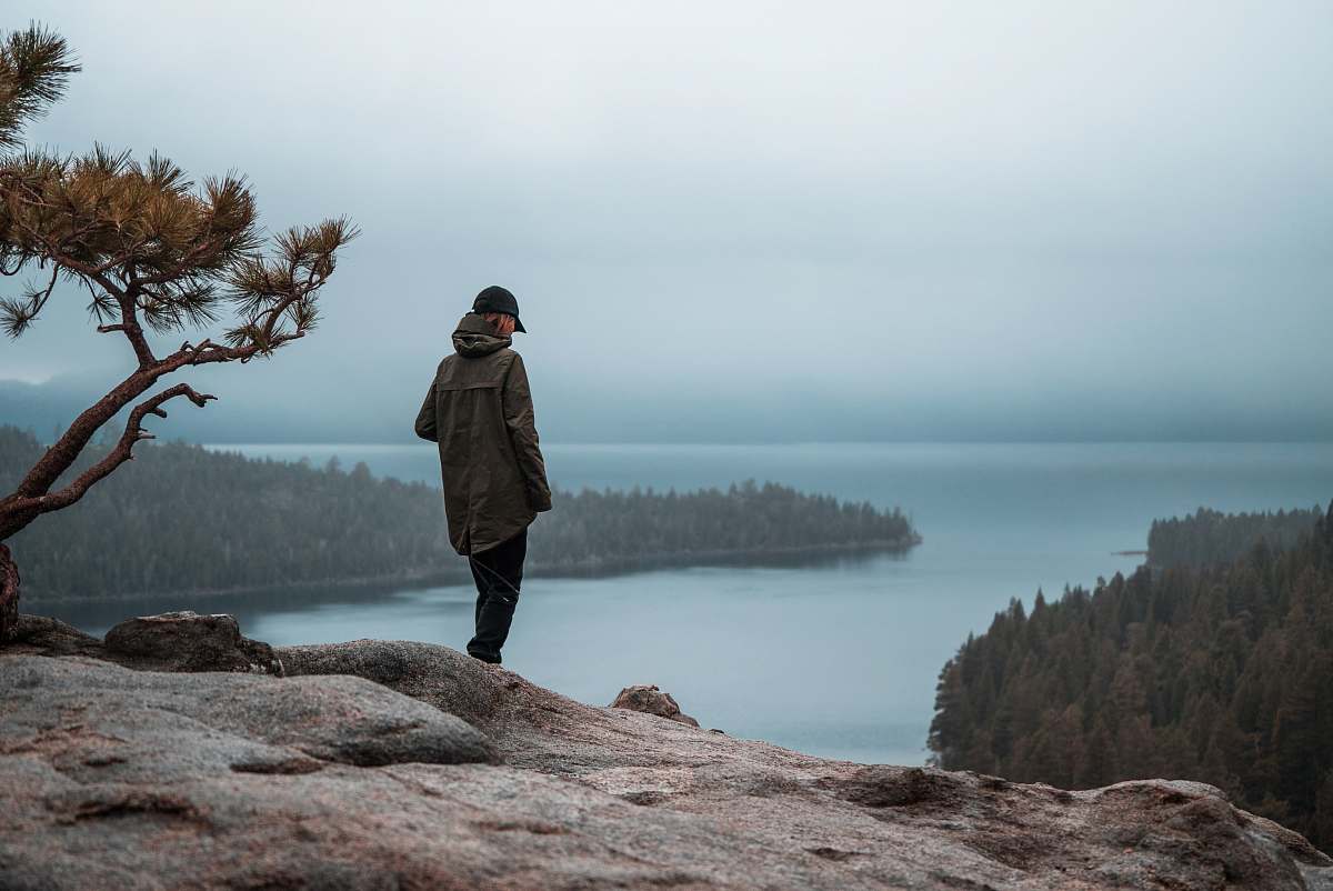people woman standing on cliff person