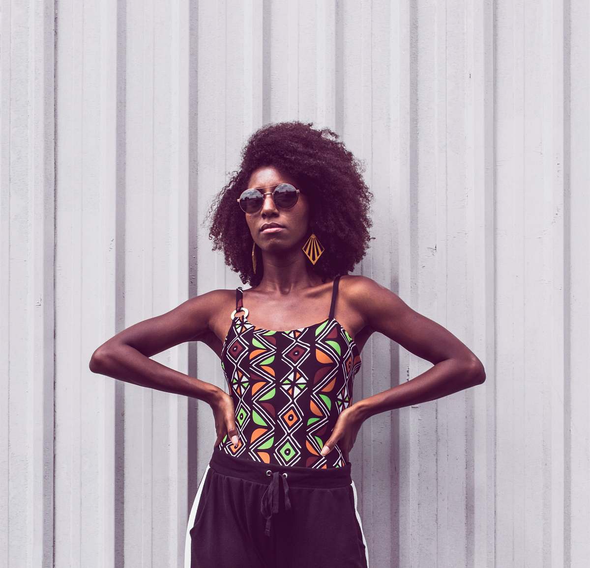 people woman standing with hands on her waist person