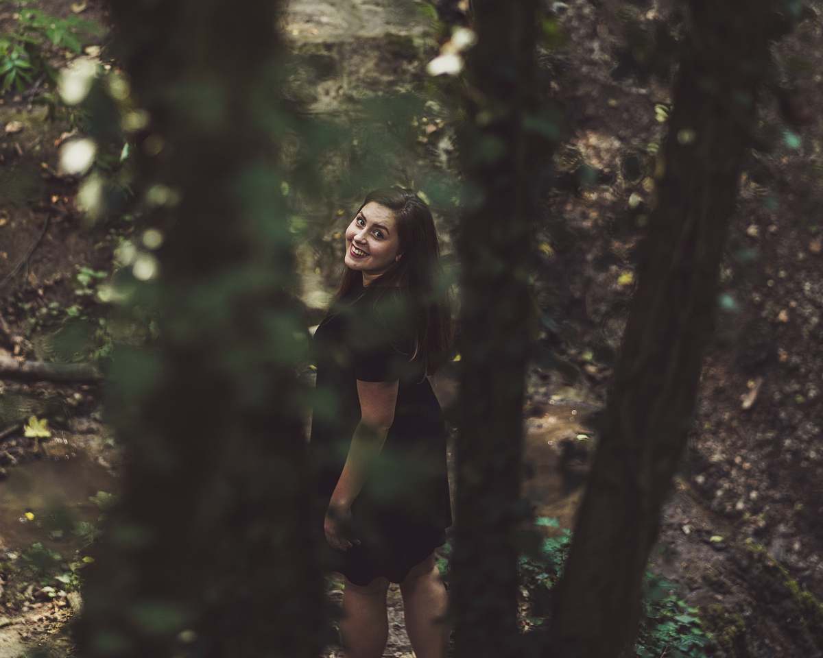 people woman walking on forest while looking up person
