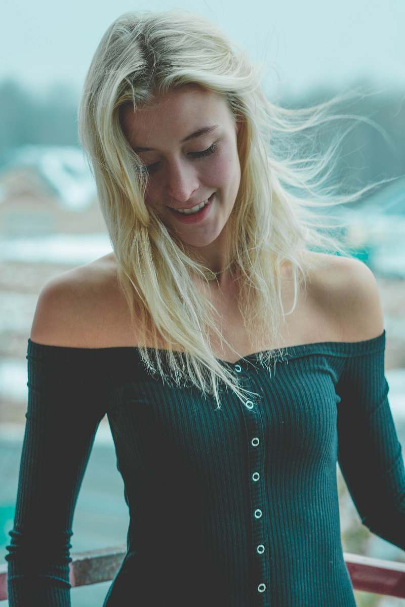 people woman wearing green off-shoulder button-up long-sleeved shirt person