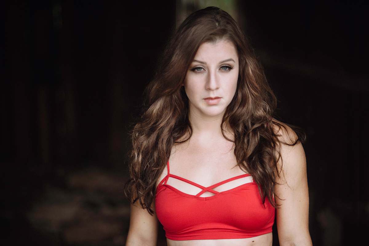 people woman wearing red bikini top person