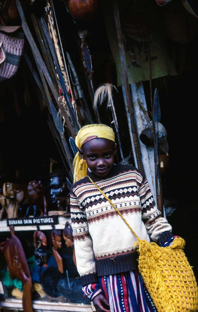 person boy carrying yellow knitted bag human