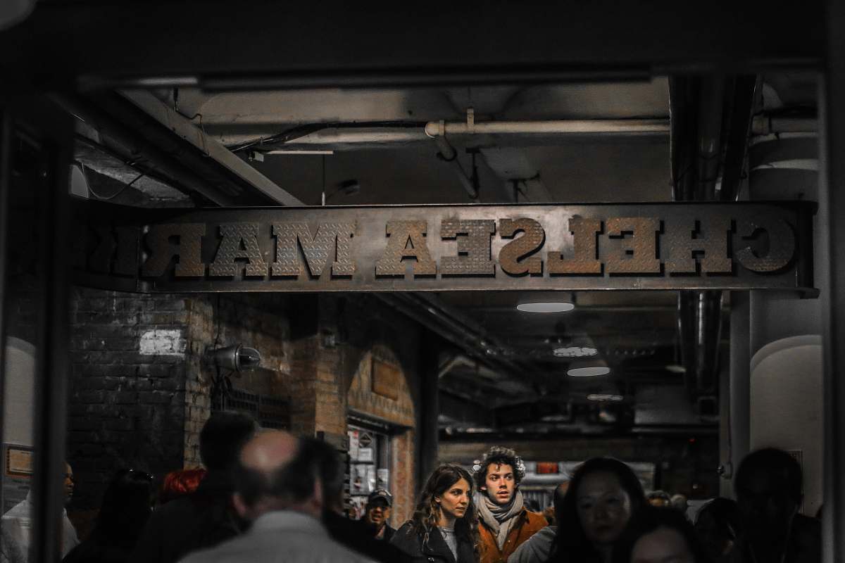 human Chelsea Mark signage person