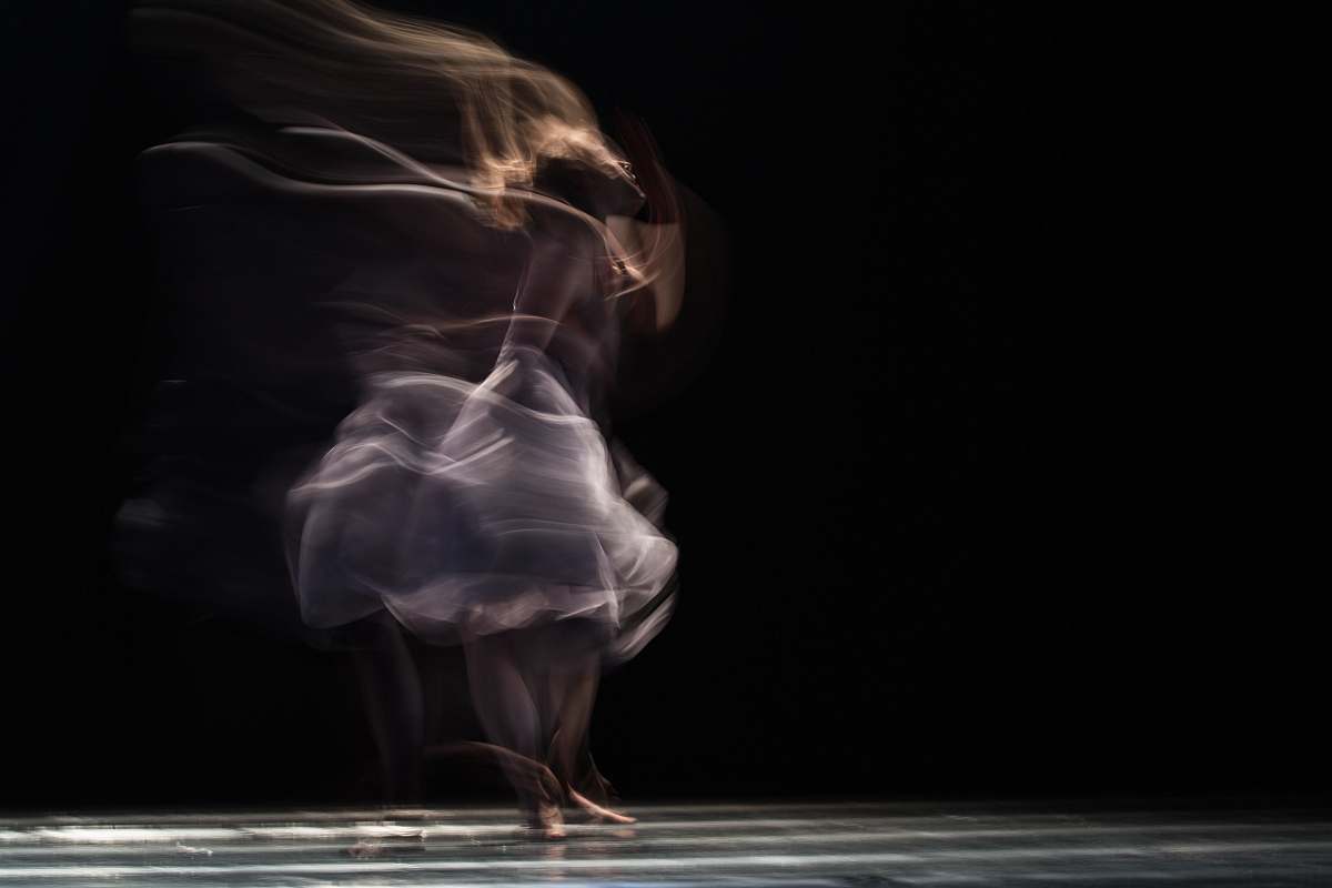 person dancing woman on concrete pavement dance