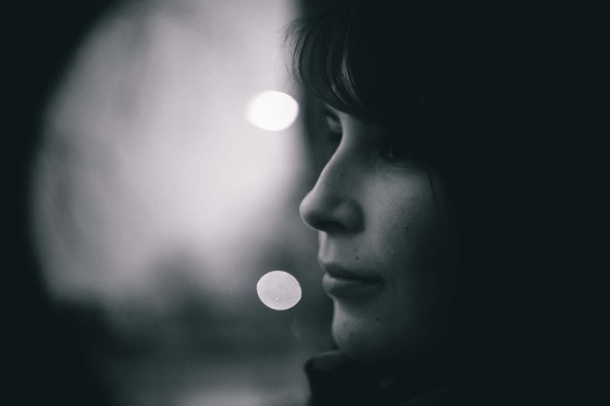 person grayscale photo of a girl face