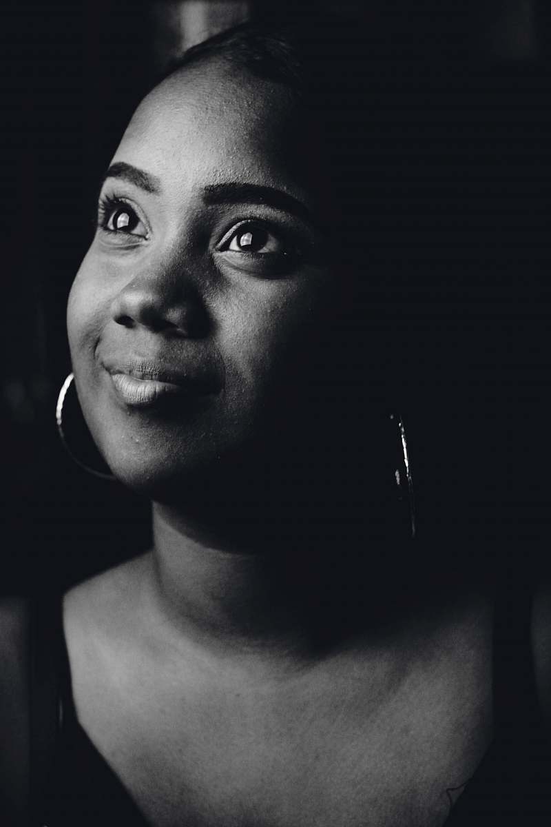 human grayscale photo of woman wearing scoop-neck top portrait