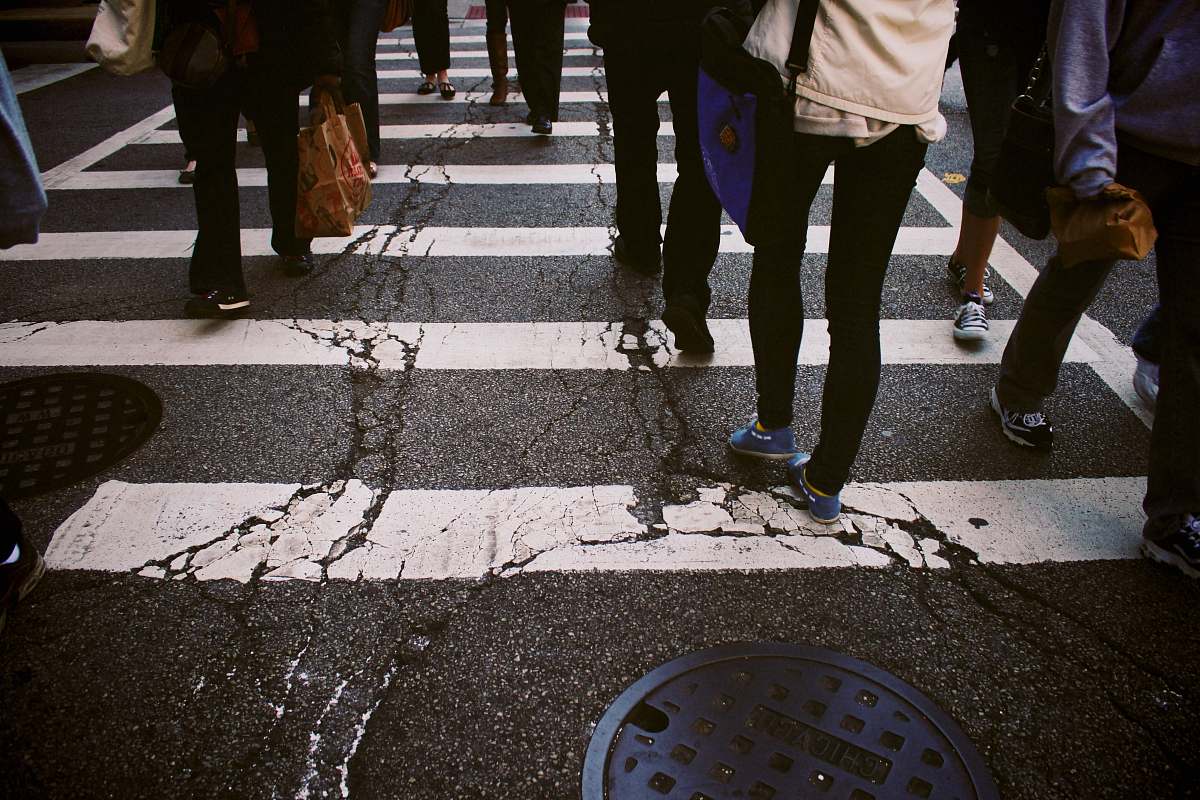 human group of person walking on pedestrian lane person