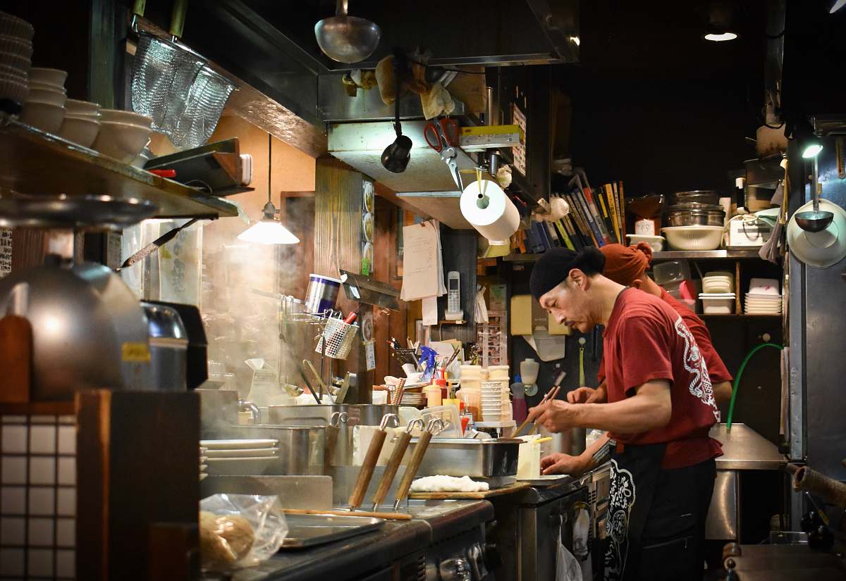 person man cooking inside kitchen human