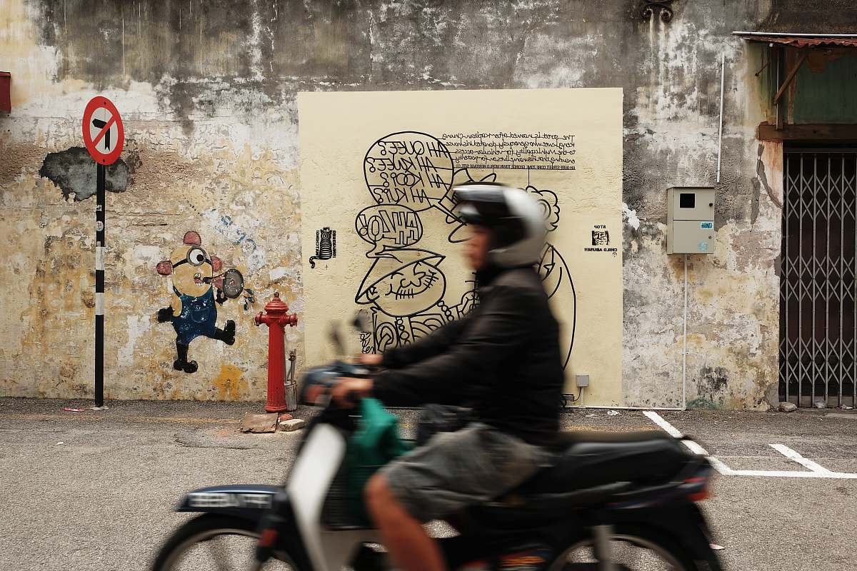 motorcycle man in black jacket riding Honda motorcycle transportation