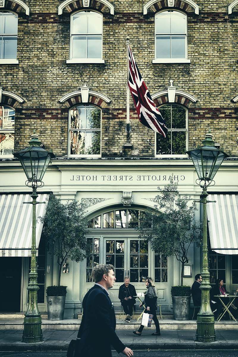 human man sitting in front of Charlotte Street hotel person