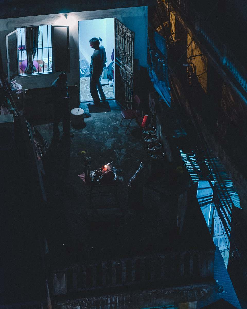 human man standing in front of door person