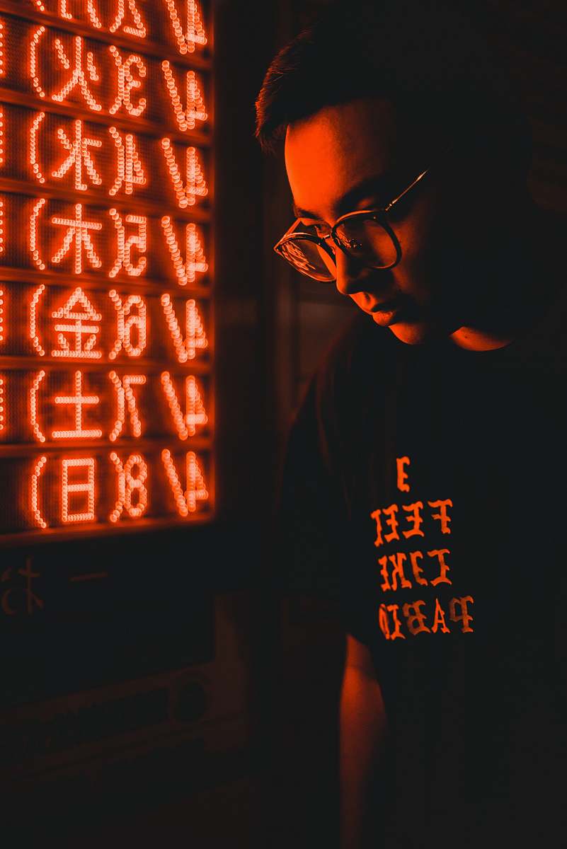 human man standing near LED signage person