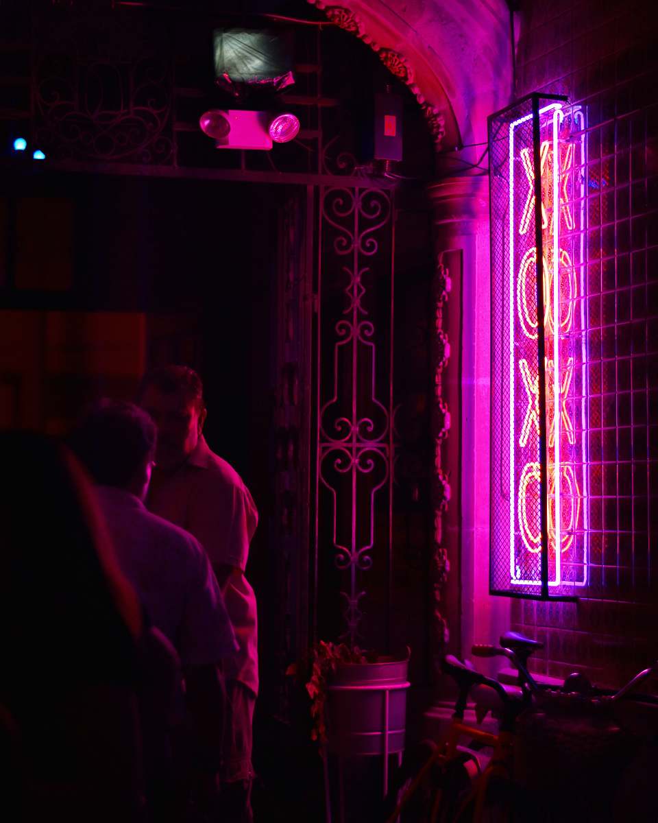 human man standing on neon light person