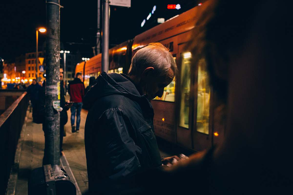 person man wearing black hoodie standing near tree human