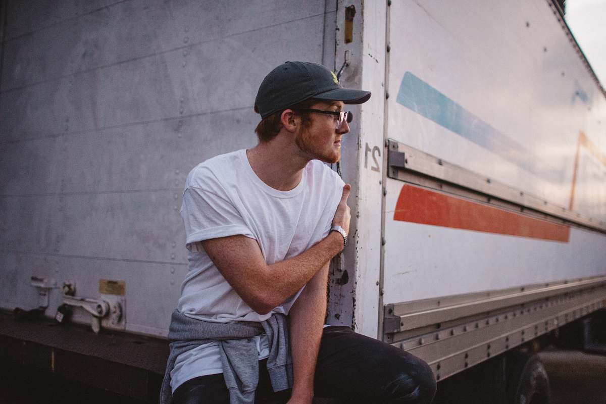 human man wearing white crew-neck t-shirt person