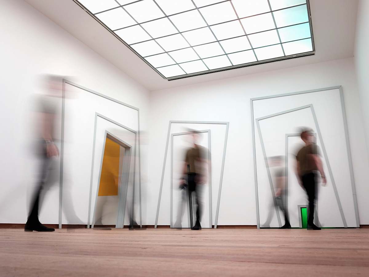 person people standing inside room skylight