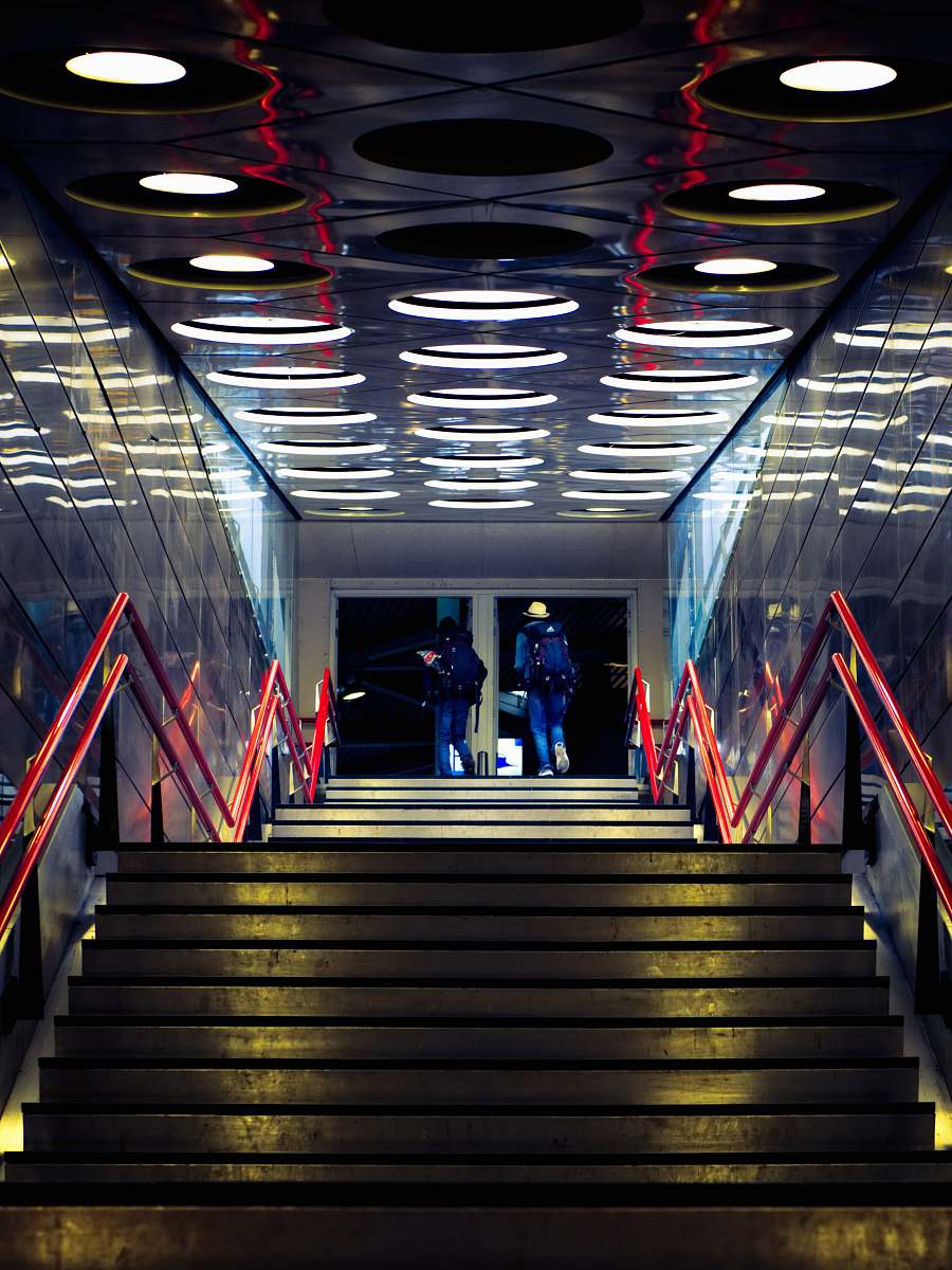 person people walking near stair human