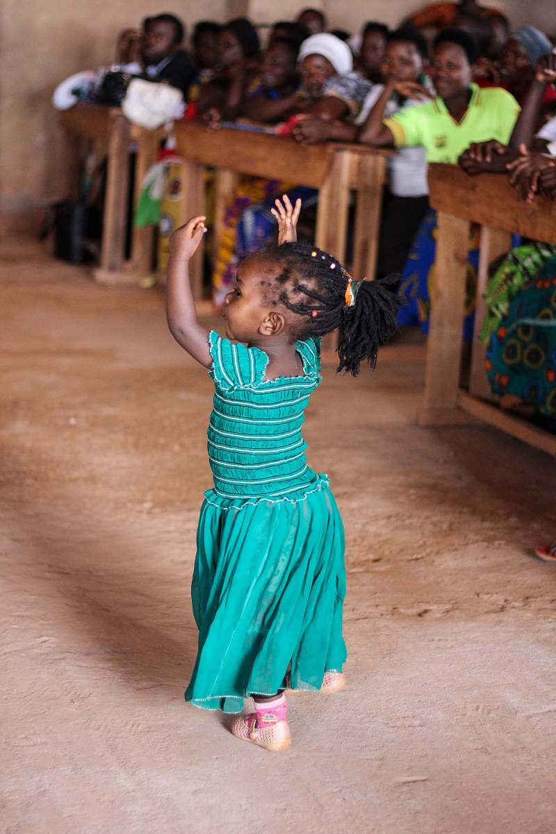 human people watching dancing girl wearing blue dress person