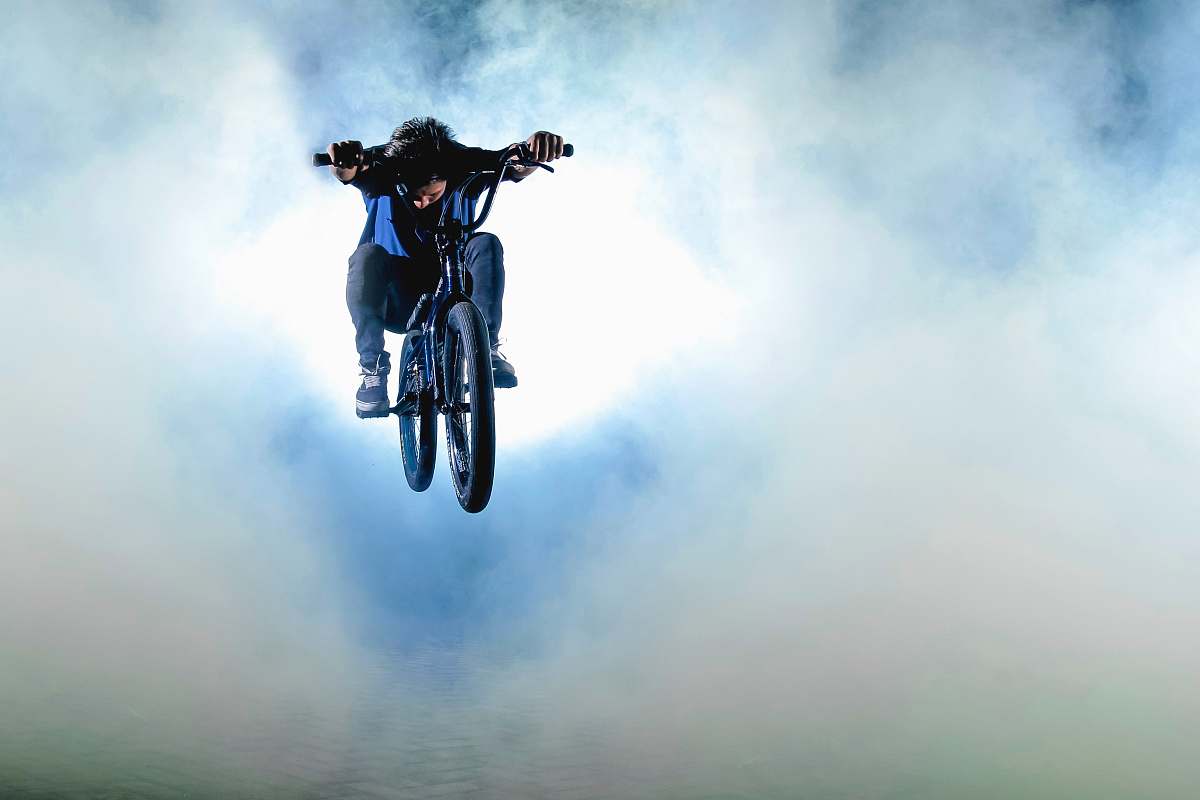 human person riding on black bicycle person