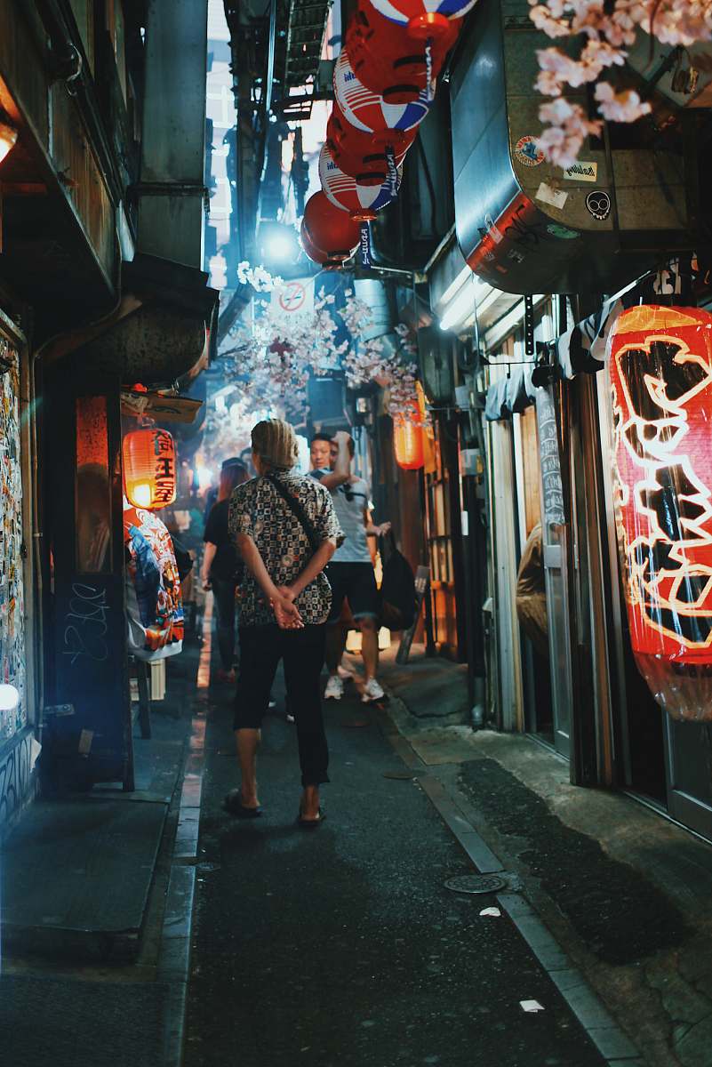 human person standing on pathway at night person