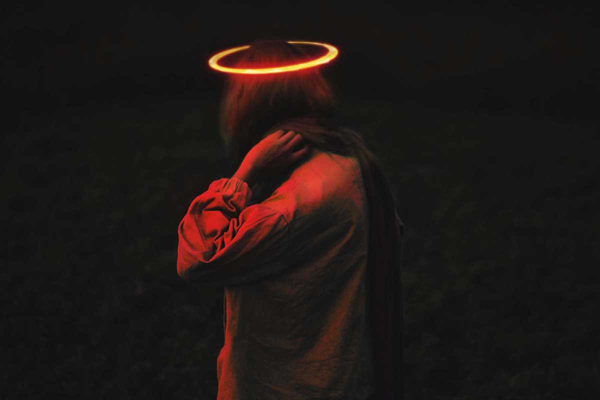 human person wearing long-sleeved top with halo person