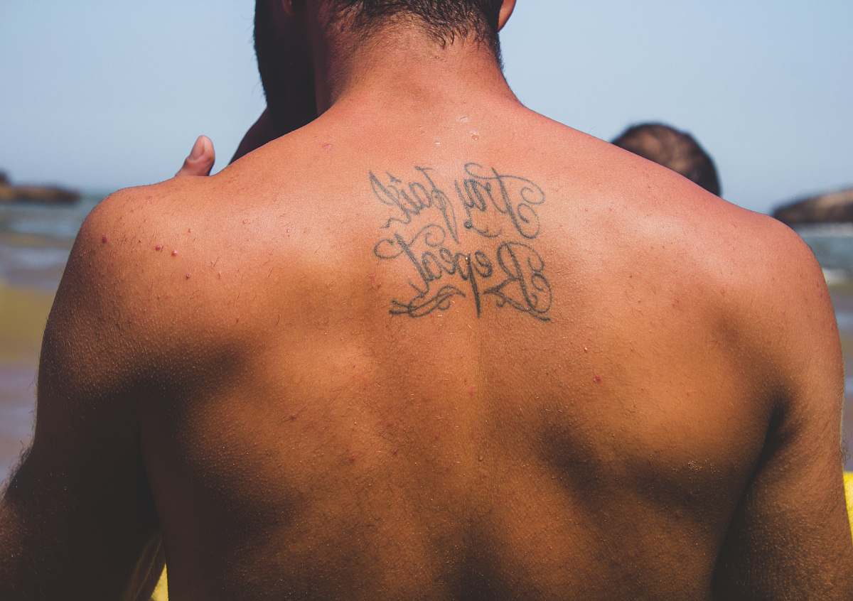 person person with try fail repeat tattoo at back human