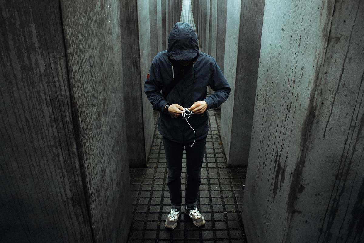 person photo of person wearing black pullover hoodie grey