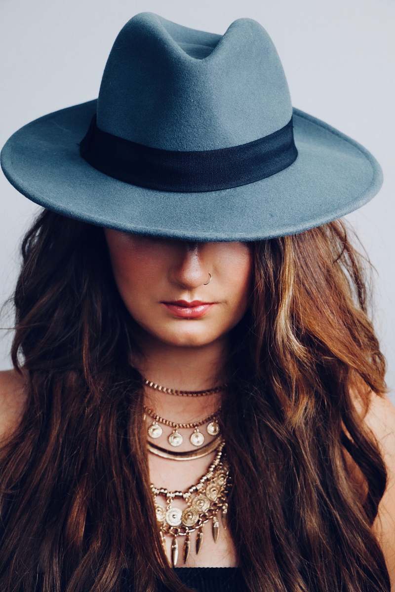 hat portrait photo oof woman wearing gray cowboy hat clothing