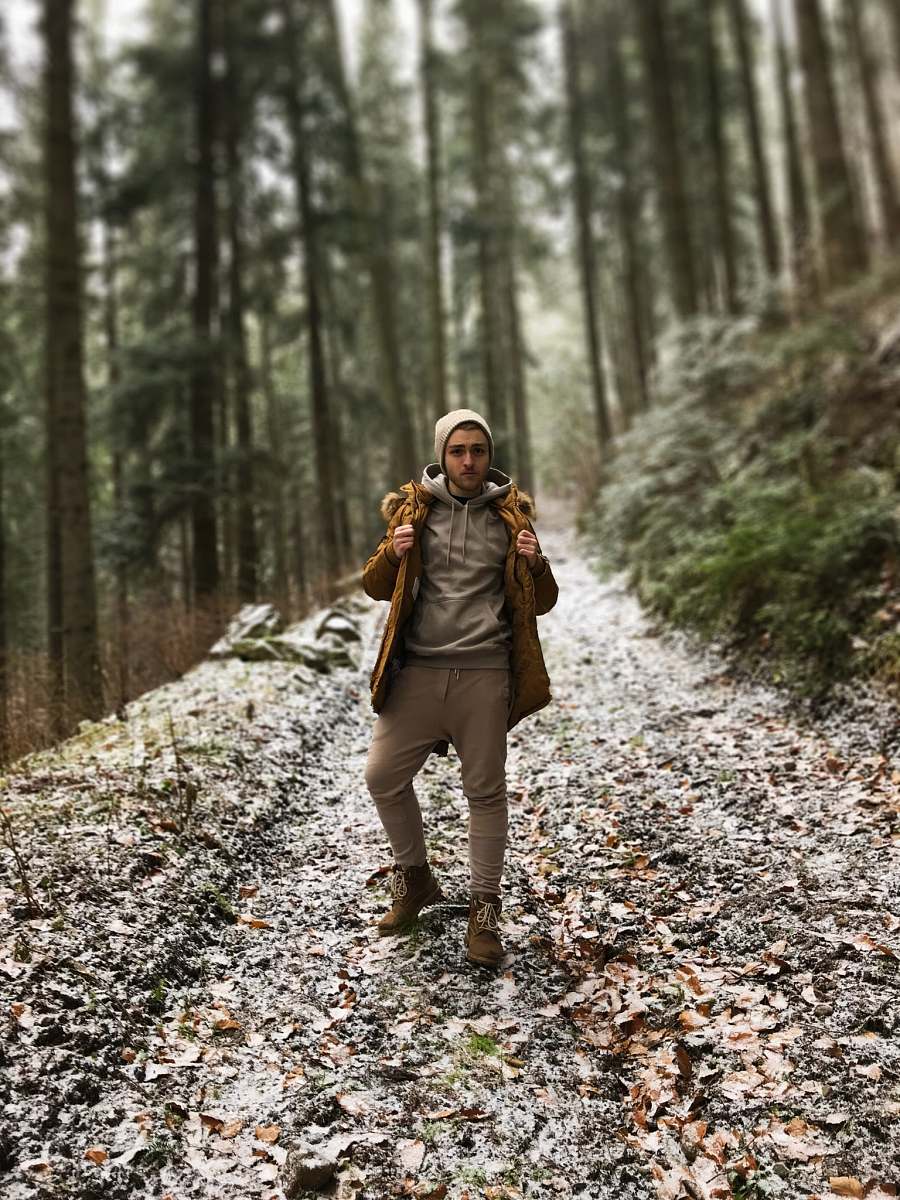 person selective focus photography of man on forest human