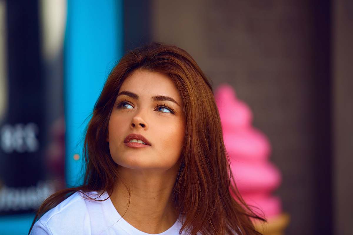 person selective photography of woman in white crew-neck shirt human