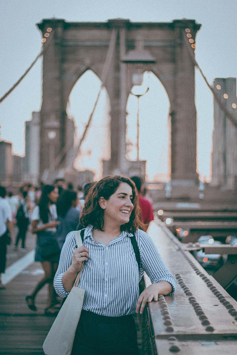 person shallow focus lens photo of woman looking sideways human