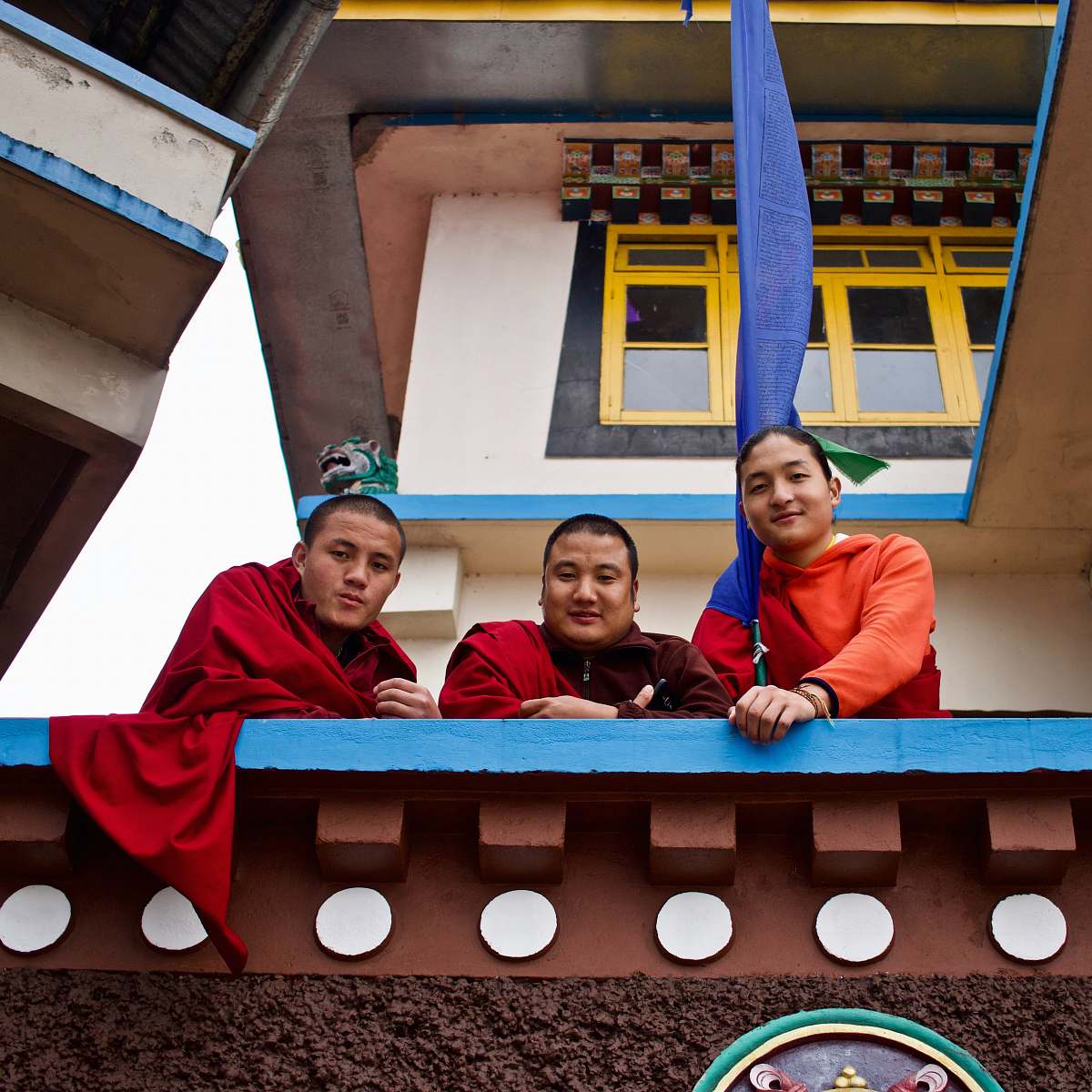 human three men standing each others person