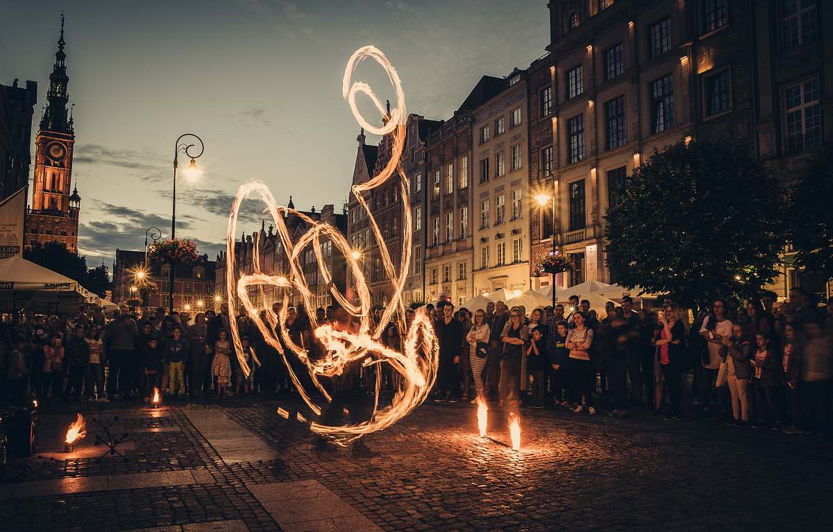 human time-lapse photography of fire dancing person