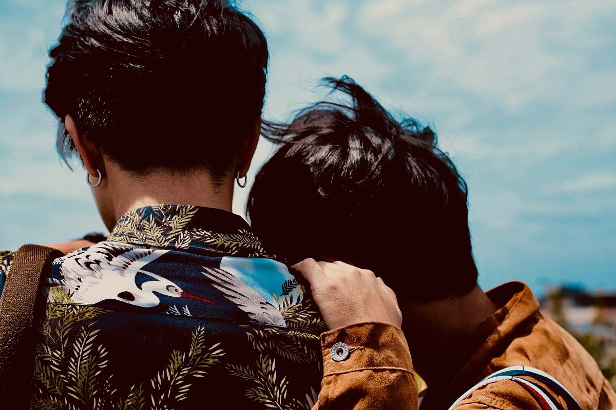 human two boy's looking at sky person