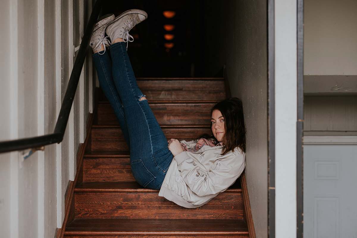 human woman lying on stairs person